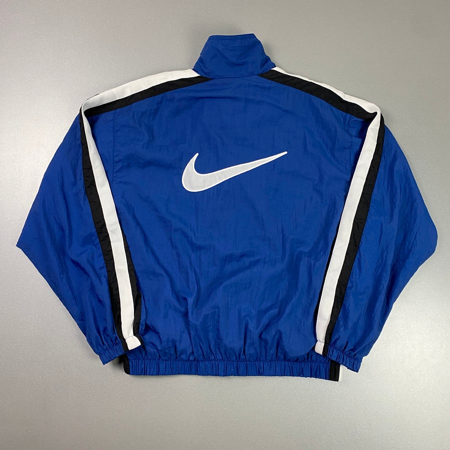 Image of Nike track jacket, size medium