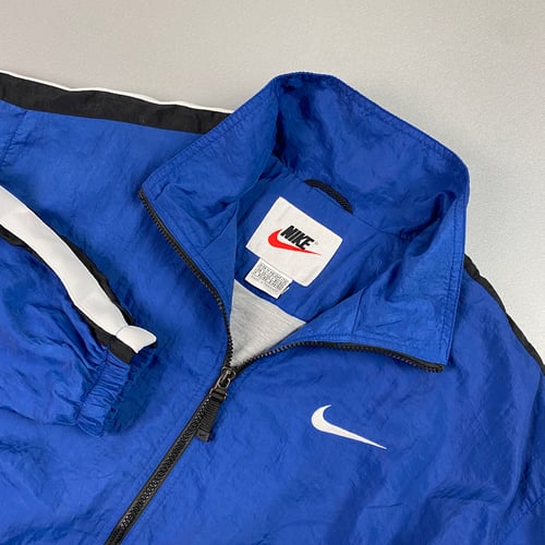 Image of Nike track jacket, size medium