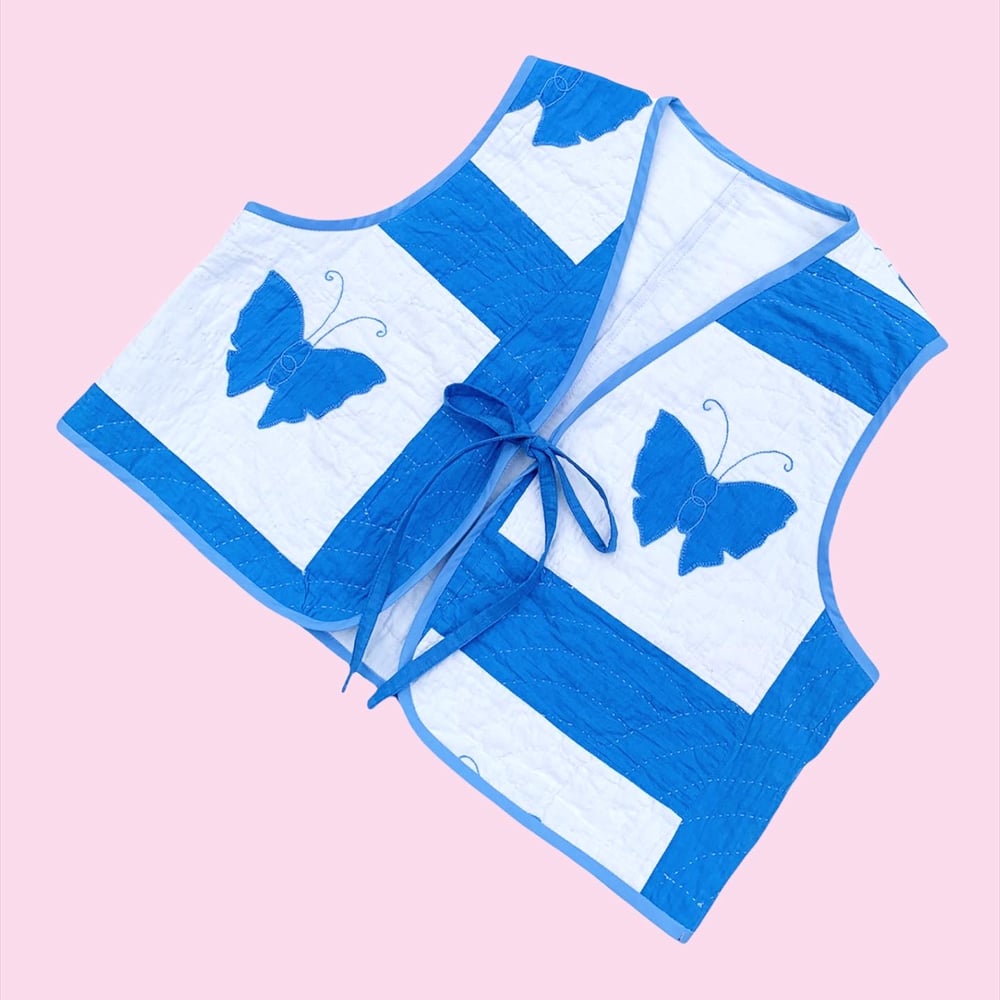 Image of Quilted Cropped Front-Tie Vest — Blue Butterflies