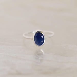 Image of Phan Thiet Light Blue Sapphire oval cut classic silver ring