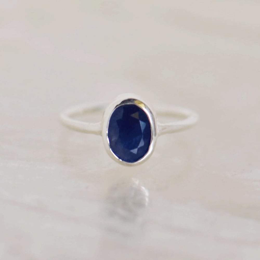 Image of Phan Thiet Light Blue Sapphire oval cut classic silver ring
