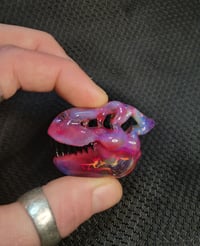 Image 1 of Purple rainbow Tyrannosaurus rex skull pendant 💜🌈