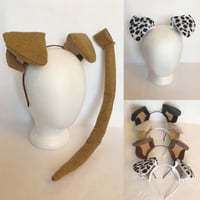 Image 1 of Dog Ears and Tail