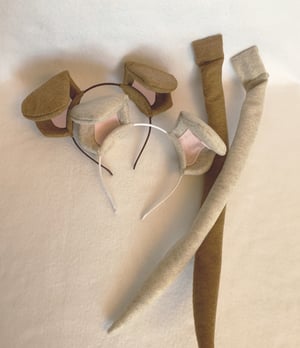 Image of Dog Ears and Tail