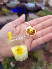 Image 3 of Pikachu and Stitch Boba Keychains