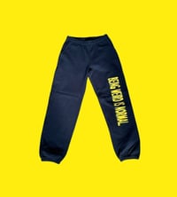 MADE IN EFFORT "BEING WEIRD IS NORMAL" SWEATPANTS IN BLACK