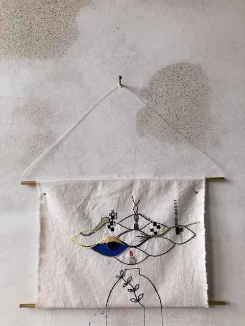 Image of The weight of the world - Hand embroidered and hand painted wall hanging, one of a kind