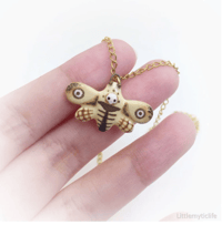 Image 1 of Death moth ceramic necklace