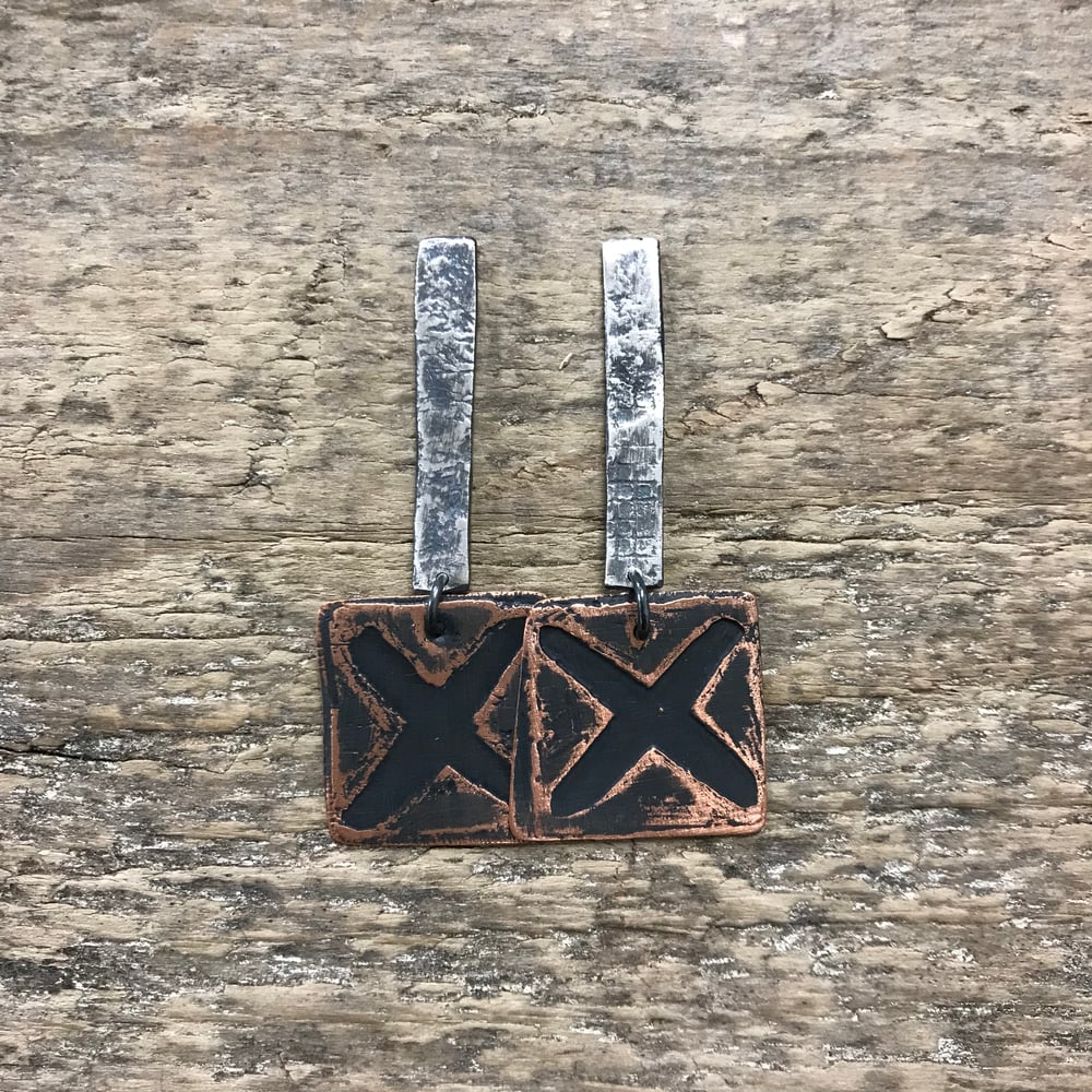 Image of etched X earrings