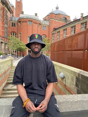 Image of POWER FIST EMBROIDERED BUCKET HAT