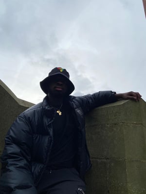 Image of POWER FIST EMBROIDERED BUCKET HAT