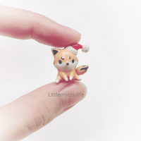 Image 1 of Christmas fox figurine 