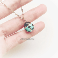 Image 1 of Green ladybug necklace