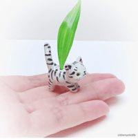 Image 1 of Tabby cat figurine with hole for dry flower