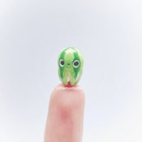 Image 1 of watermelon octopus figurine 2