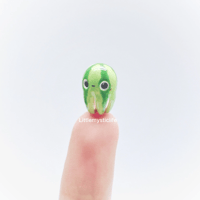 Image 2 of watermelon octopus figurine 2