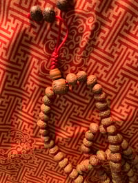 Image 1 of rudraksha mala red 