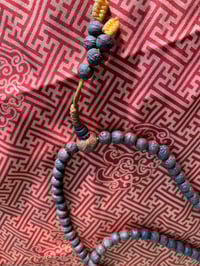 Image 1 of rudraksha mala yellow