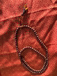 Image 2 of rudraksha mala yellow