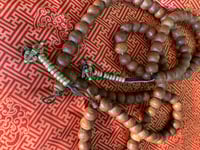 Image 1 of bhodi seed mala with dorje/bell