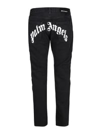 Image 1 of PALM ANGELS LOGO PRINTED DENIM JEANS IN BLACK