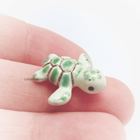 Image 1 of Green baby turtle figurine