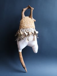 Image 1 of Figure with ring pulls.