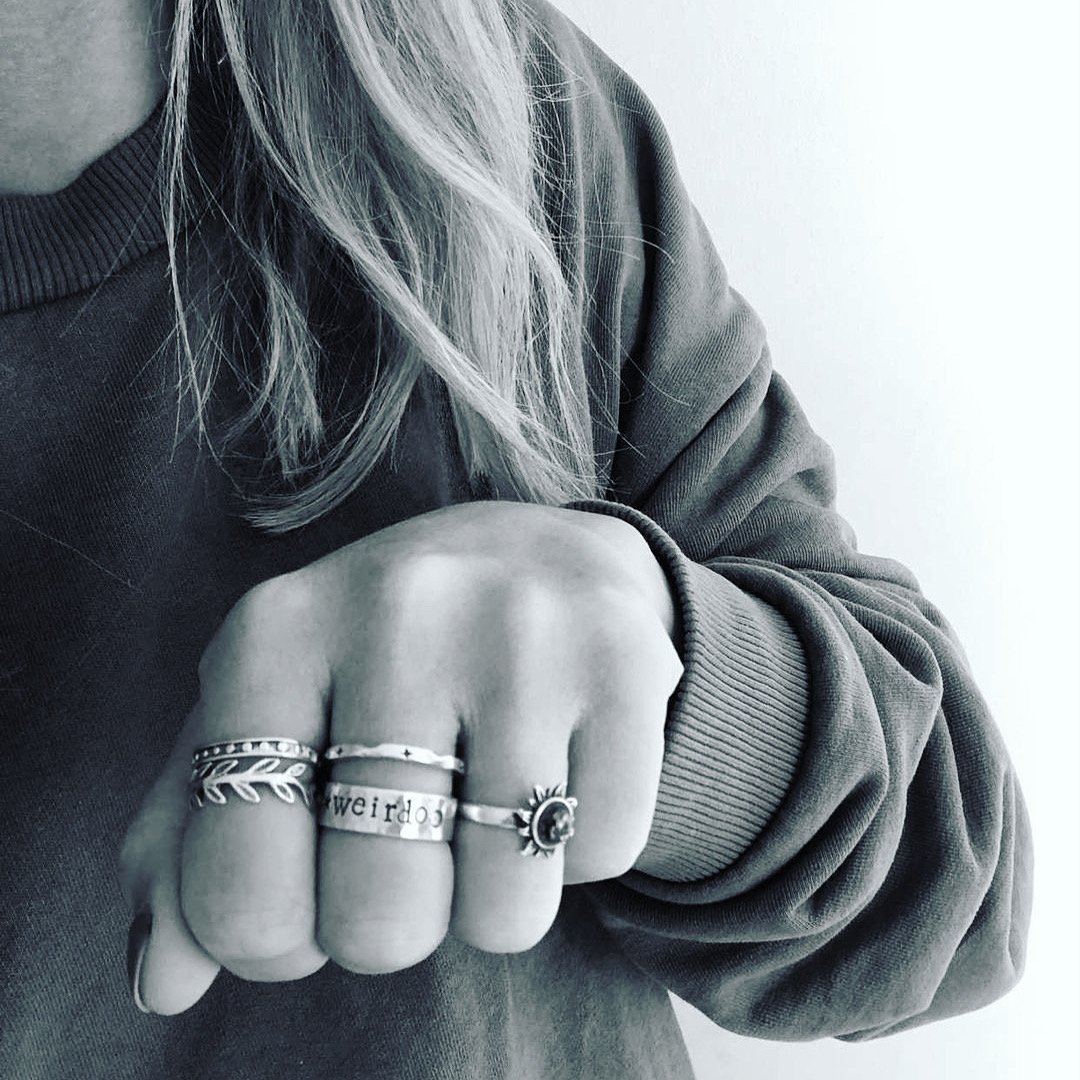 Image of Weirdo silver ring with star and moon stamp. Hand stamped silver 925 ring.