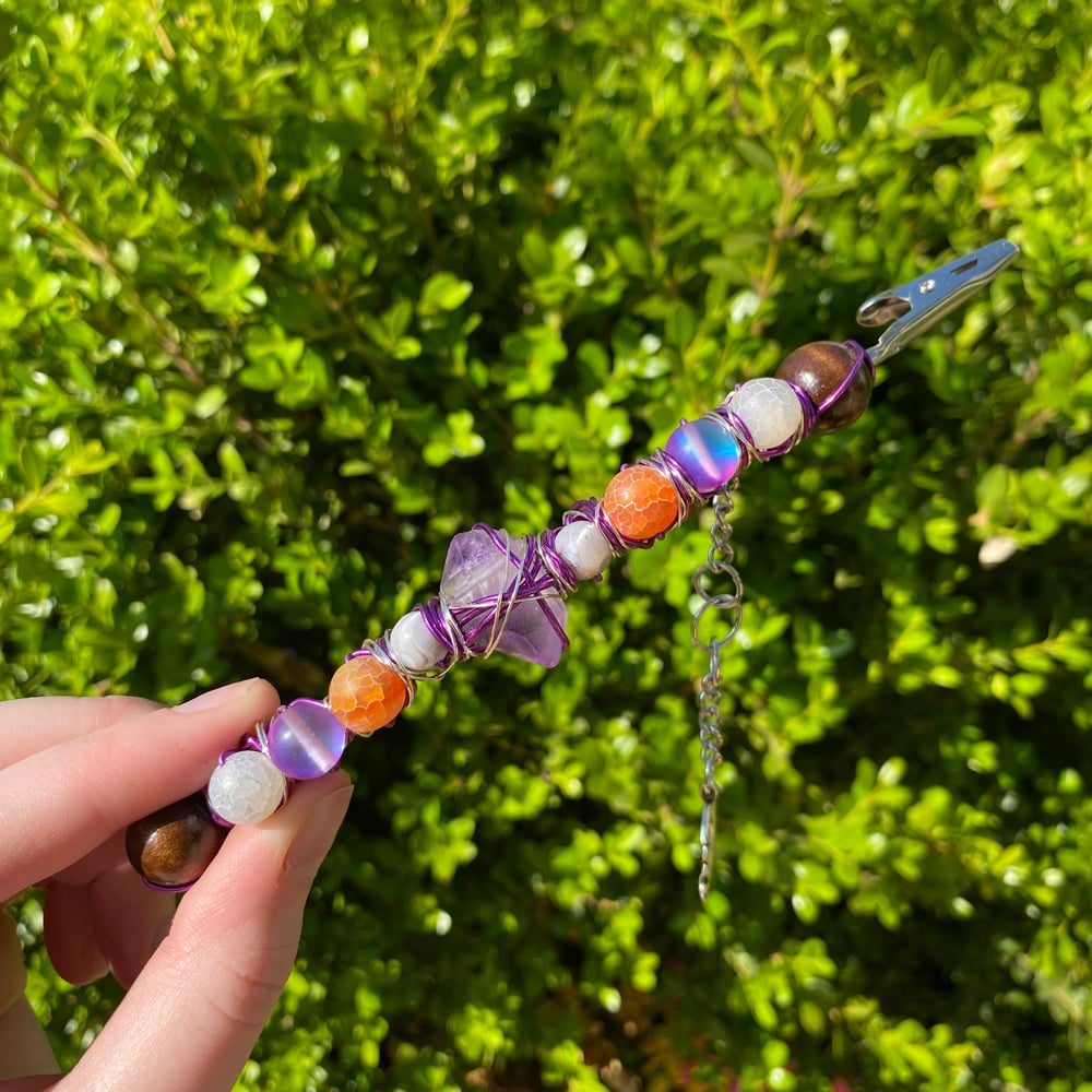 Image of violet sunset roach clip 