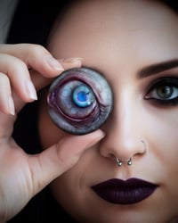 Image 18 of Custom Swappable Phone Grip for smartphones, bright blue reflective pupil, glow in the dark 