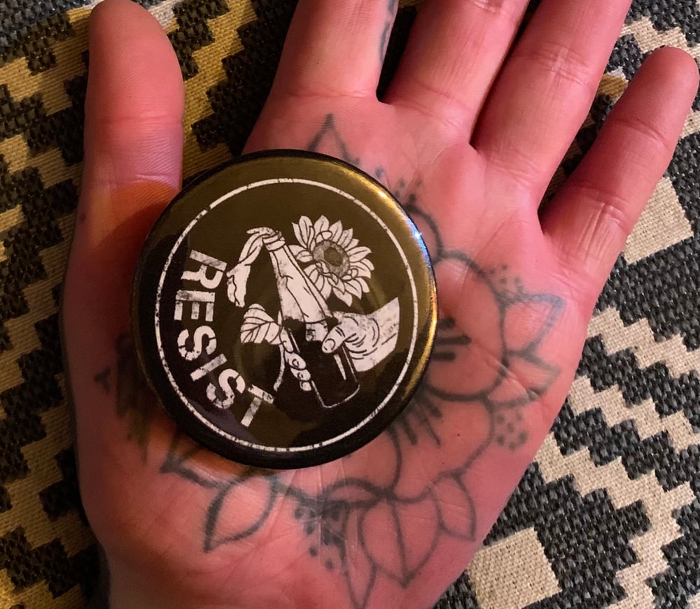 Image of Black and white Molotov pin badge