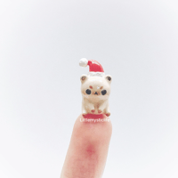 Image 1 of Tiny santa bear figurine