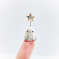 Image 1 of Star ghost figurine