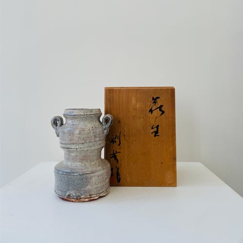 Image of A Japanese art vessel and a vintage Dutch pink oval block vase 