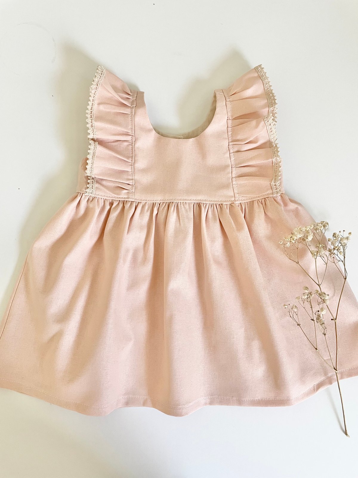 Image of Kelsey dress is peachy blush 