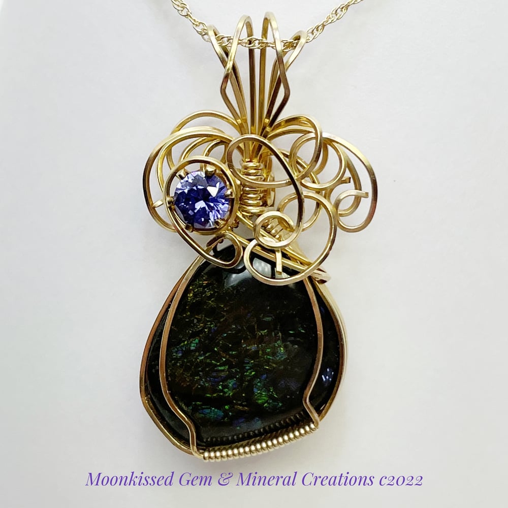 Image of Deep Blue Ammolite with "Tanzanite" CZ 14 Karat Gold Fill Wirewrapped Pendant