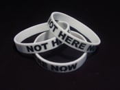 Image of NOT HERE NOW wristband