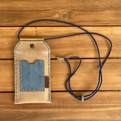 Image of Funda de móvil beige y azul