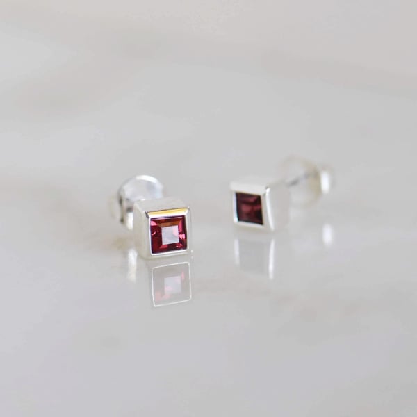 Image of Red Garnet square cut silver stud earrings