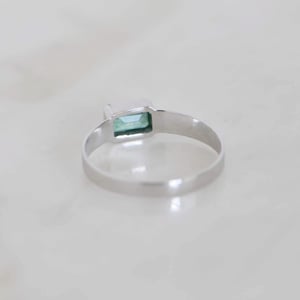 Image of Colombia Emerald emerald cut 950 platinum plated 14k gold flat band ring