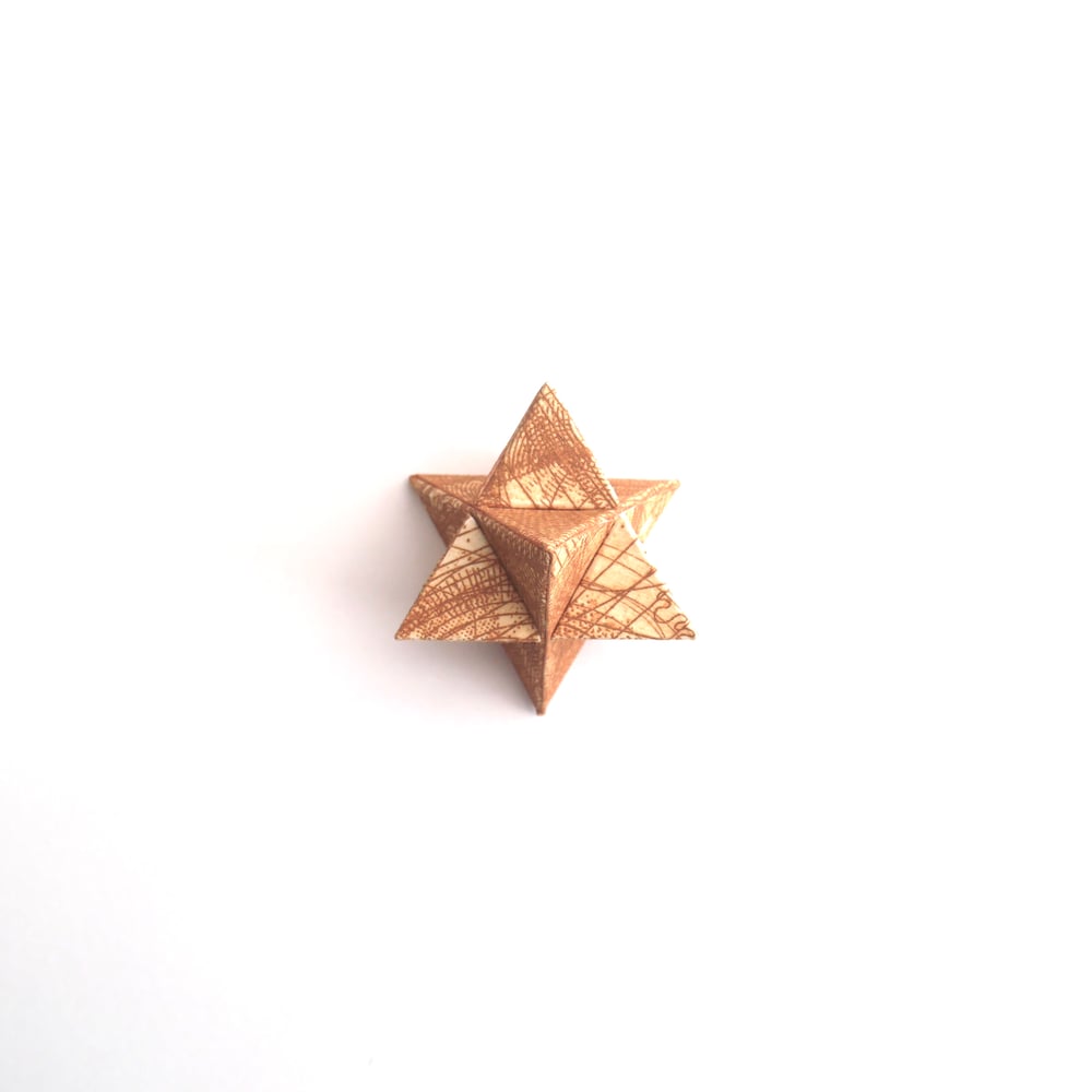 Image of Small Polyhedral Form - Two tetrahedrons in burnt sienna