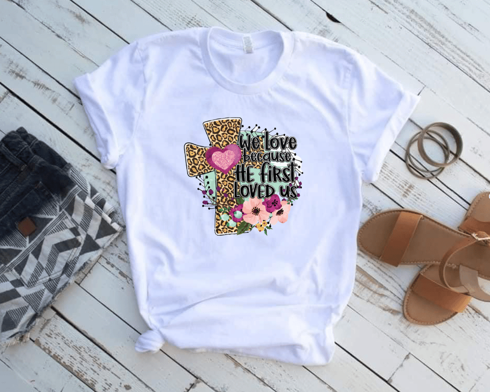 Image of "Because he loved us first" Easter Tee