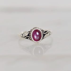 Image of Vietnam Red Star Ruby oval shape cabochon cut vintage style silver ring