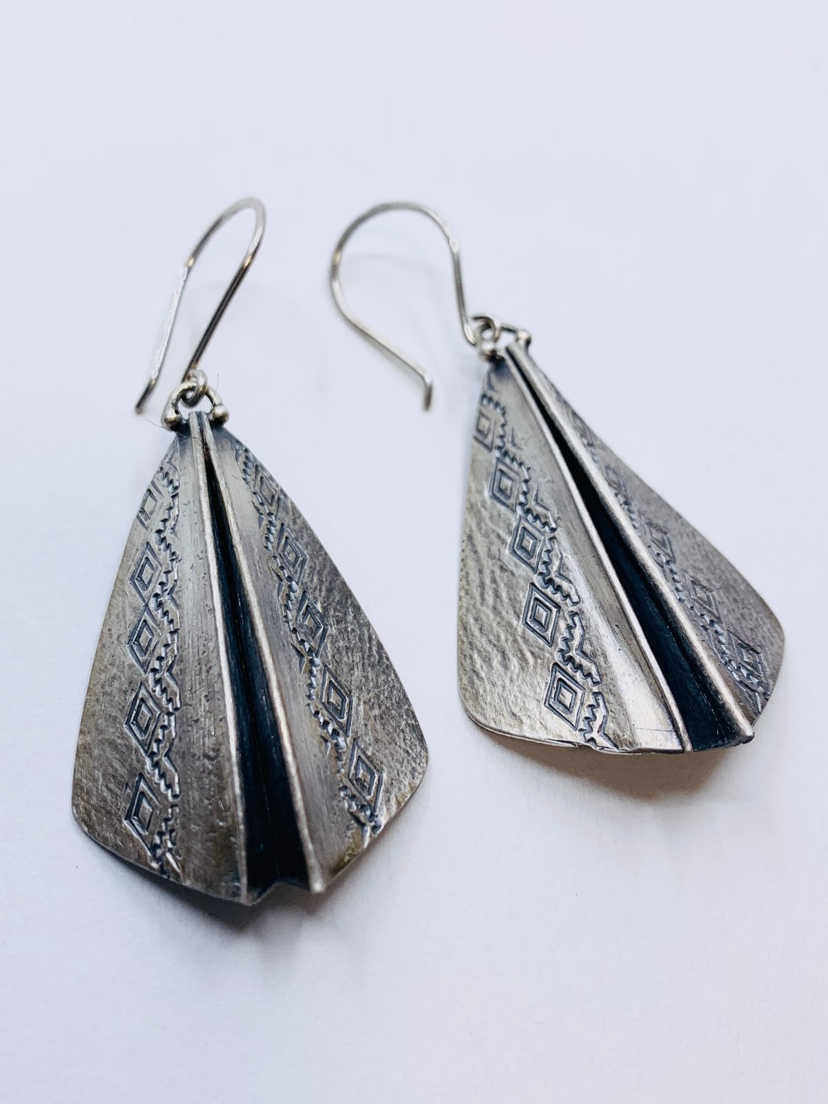 Silver Triangle Earrings With Diamond Pattern by Lauren Nall