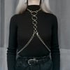 Silver chain harness and multiple rings