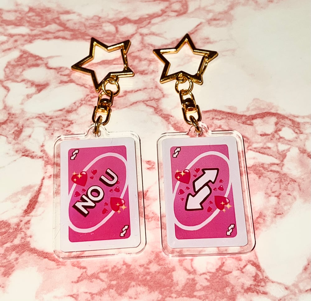 Image of Reverse Uno Card double sided acrylic star clasp keychain