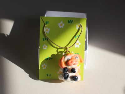 Image of Orange Cow Clay Charm Necklace