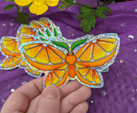 Image 1 of Orange Moth Holographic Sticker