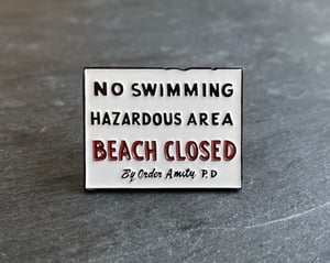 Jaws inspired "No Swimming" soft enamel pin badge.