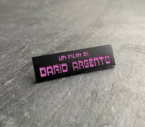 Un Film Di Dario Argento soft enamel pin badge - purple glitter variant